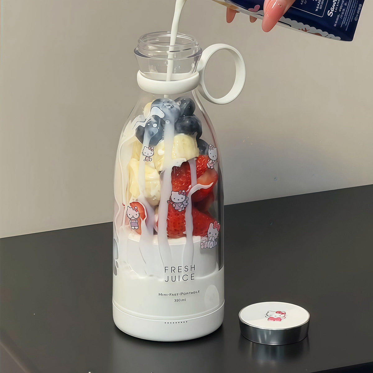 Portable Juice Cup with blueberries and strawberries
